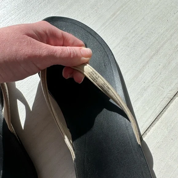 OluKai Women's Black and Gold Flip Flops - Picture 4 of 7